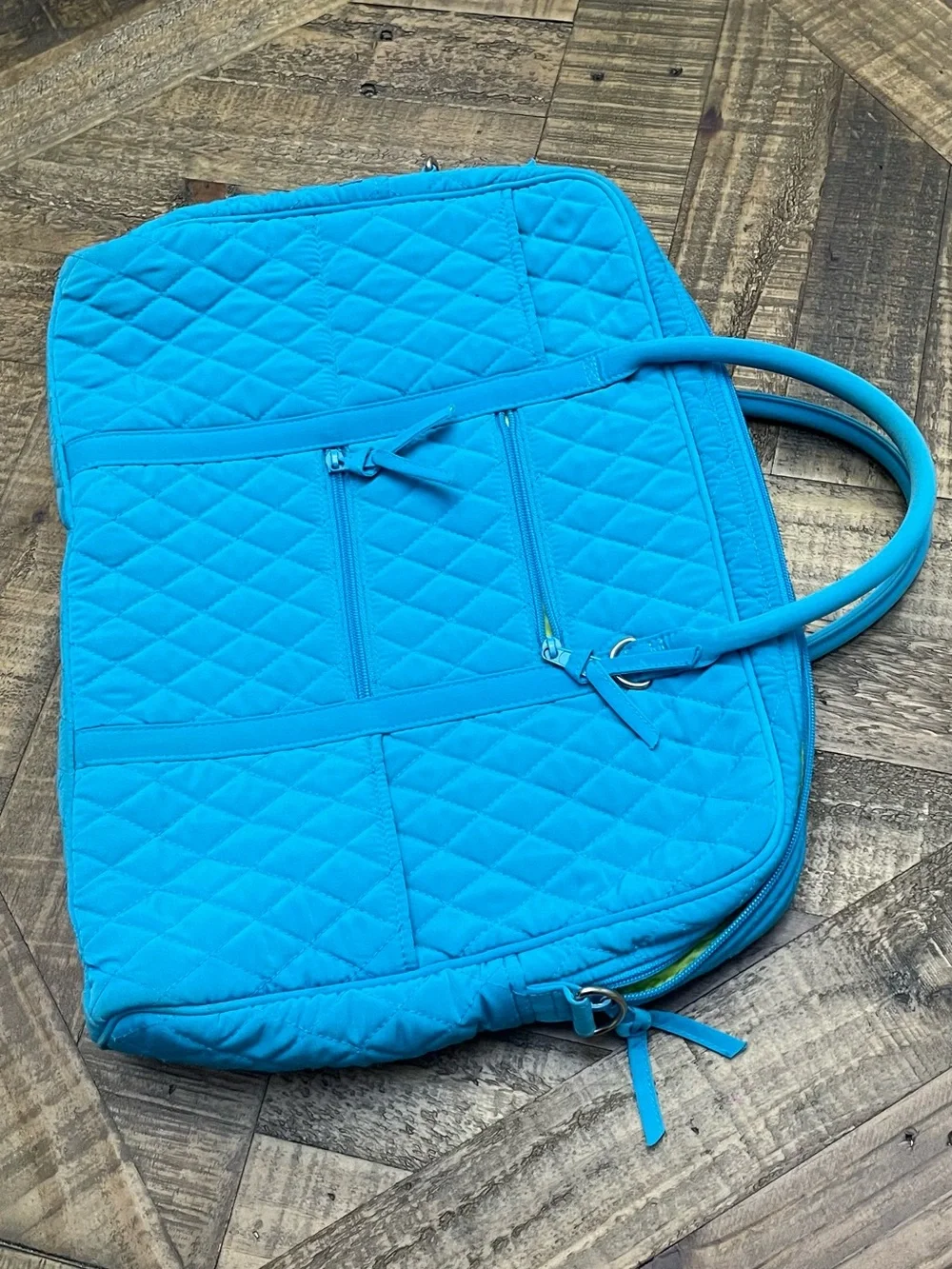 a Vera Bradley Microfiber Turquoise Large Laptop Bag.